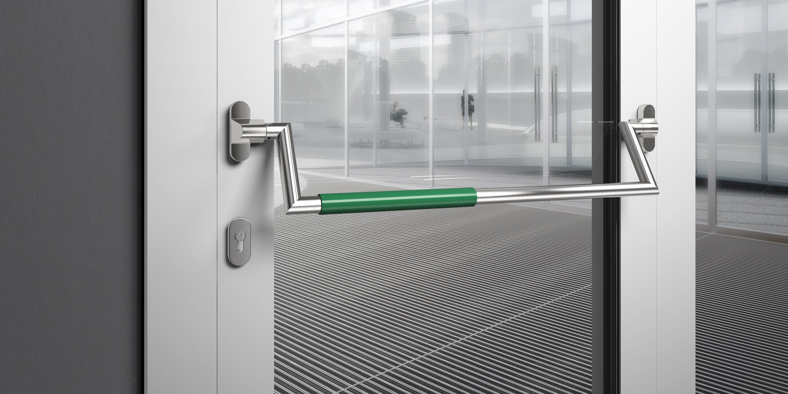 HEWI panic bar stainless steel matt Panic bar on a public building door made of matt polished stainless steel with green polyamide handle tube