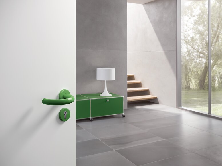 HEWI lever handle U-shape May green Lever handle with curved U-shape in the colour may green made of polyamide
