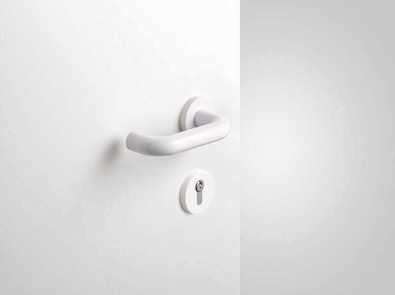 HEWI lever handle signal white Lever handle with key rosette in the colour signal white made of polyamide