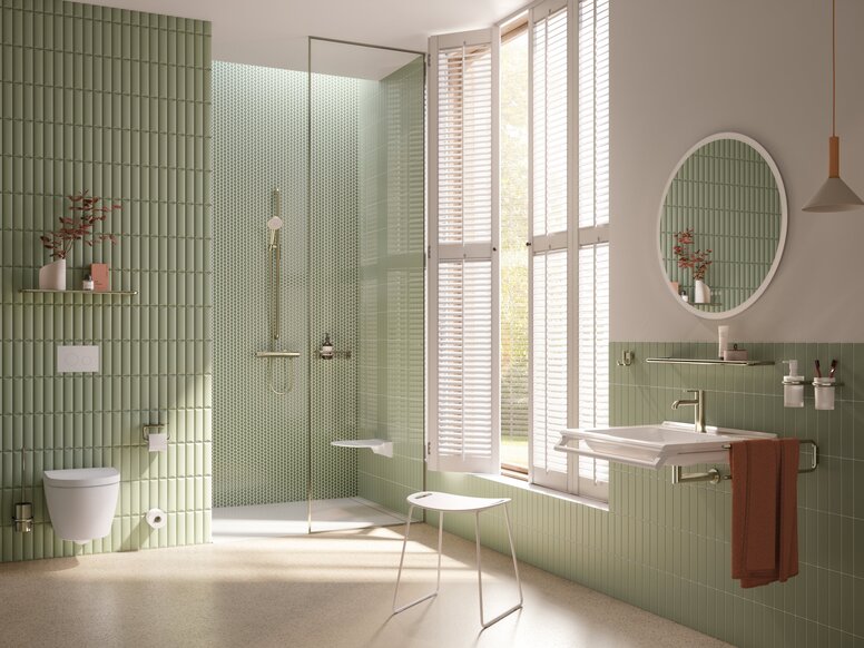 HEWI Range 480 PVD Interior Accessible, eco-friendly bathroom with a stool by the wheelchair-accessible washbasin and a hinged seat in the shower