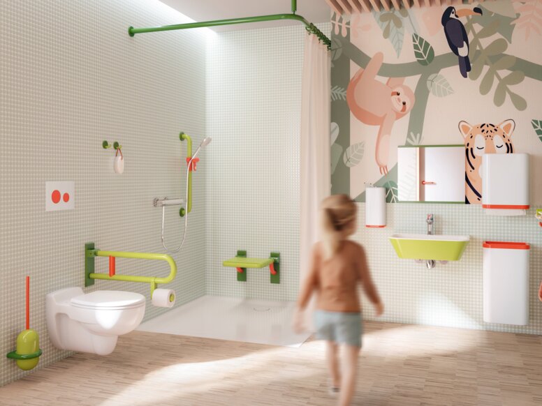Children’s bathroom with a wall-mounted WC, a hinged grab rail in coloured colours, a coloured washbasin and a hinged shower seat