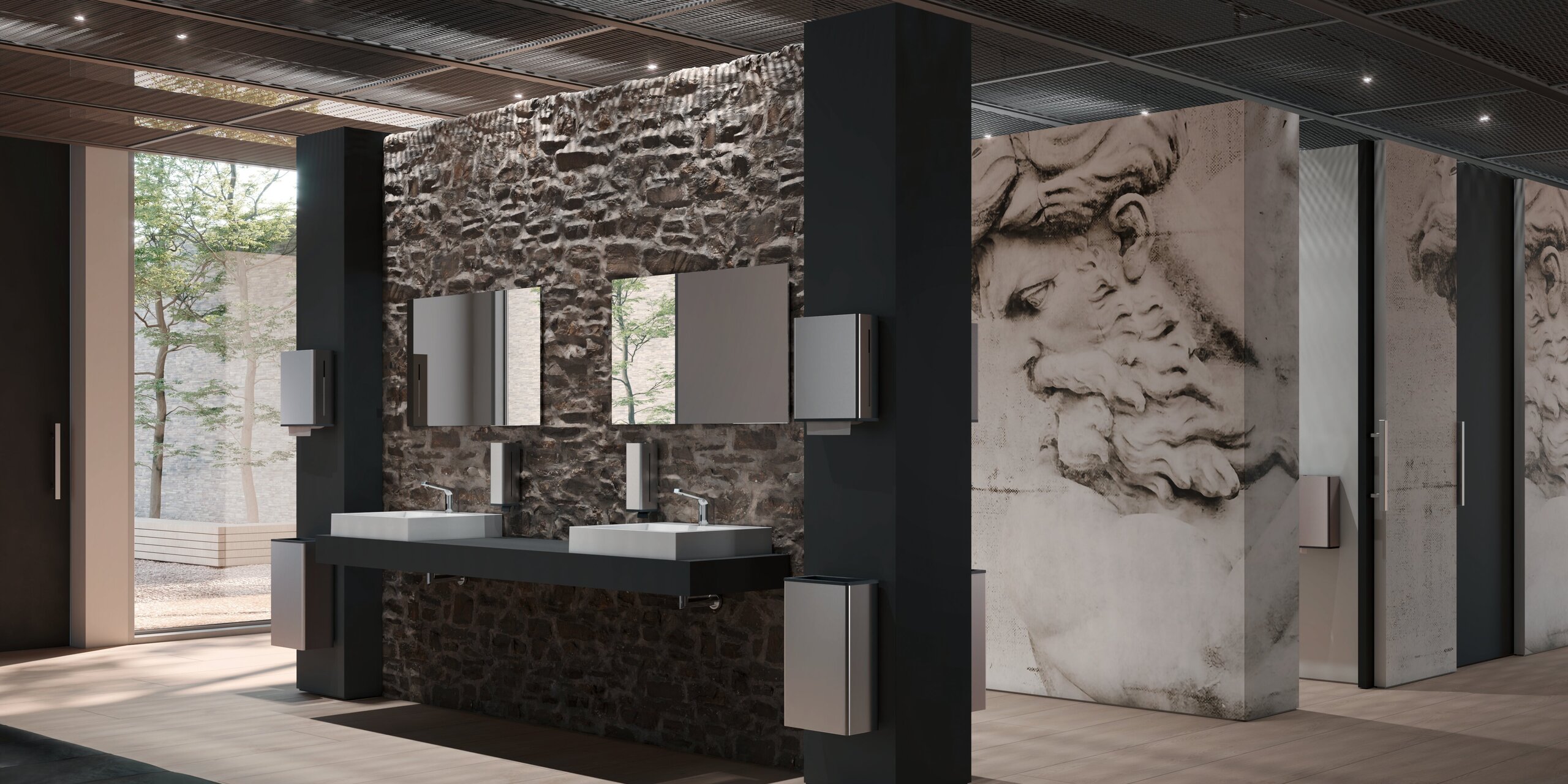 Two square countertop washbasins with two taps on a dark washbasin top in the public WC