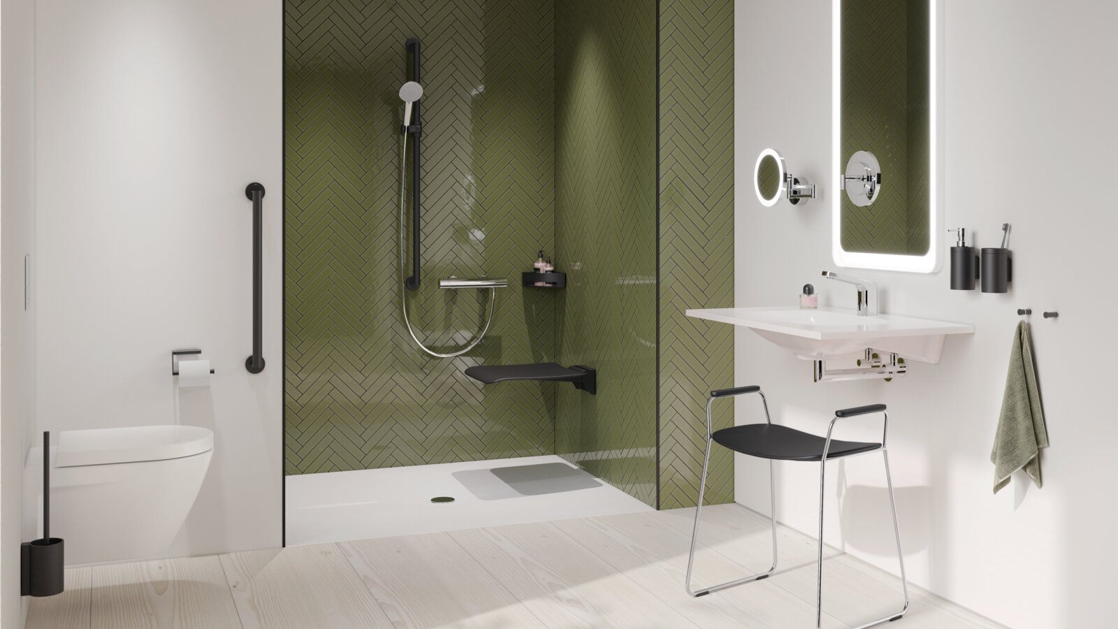 HEWI System 900 Interieur Haltegriff neben einem WC, schwarzer Klappsitz und schwarzer Duschhandlauf in der Dusche mit grüner Fliesenwand