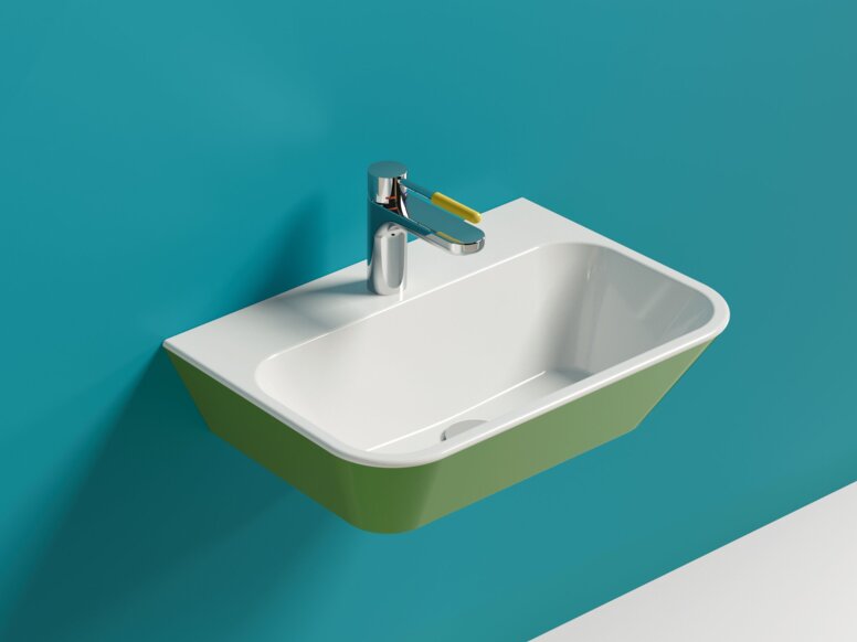 Wall-mounted green mineral composite washbasin with a square shape and a tap with a yellow lever handle against a blue wall