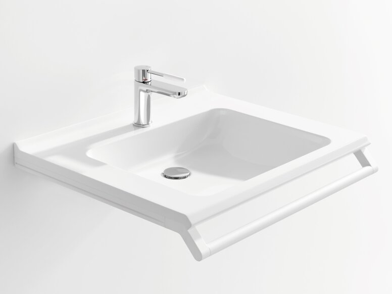 White washbasin with a rectangular bowl, a chrome-plated tap and a support rail along the front edge