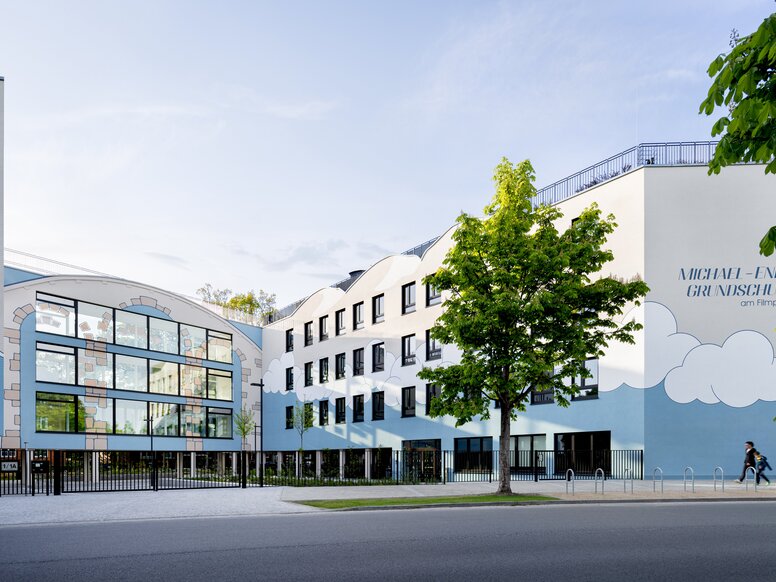 School building behind a fence