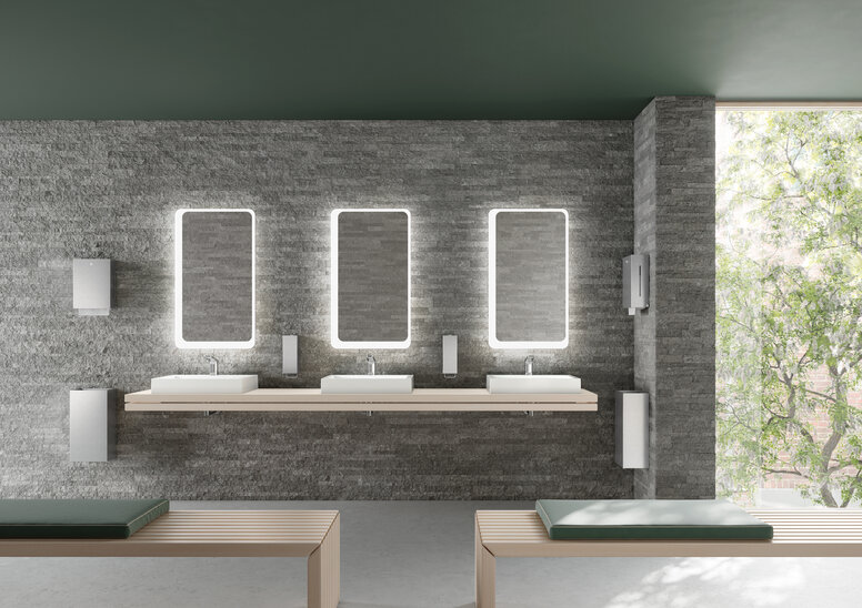 HEWI dispenser systems for public bathrooms Public washing area equipped with a waste bin, soap and paper towel dispenser in matt stainless steel